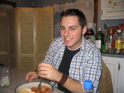 Ryan enjoying Kerri's world famous Lasagna.